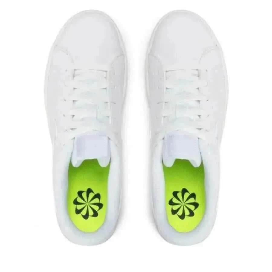 Nike Women's White Sneakers with Laces and Slip-On Design